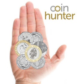 Coin Checker hand with 2013 Anniversary of the Guinea £2