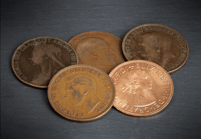 Own five sought-after classic British Pennies - spanning five different monarchs